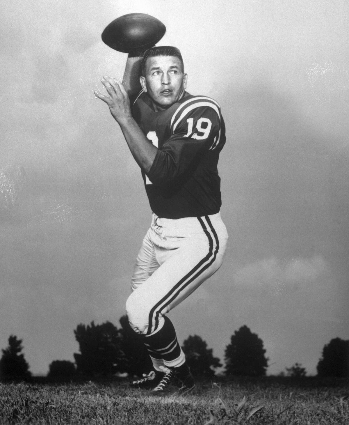 Football Player Johnny Unitas Throwing a Football