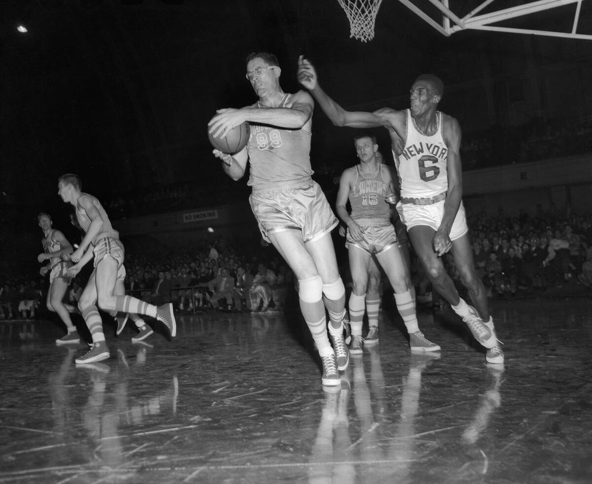 George Mikan Grabbing a Rebound