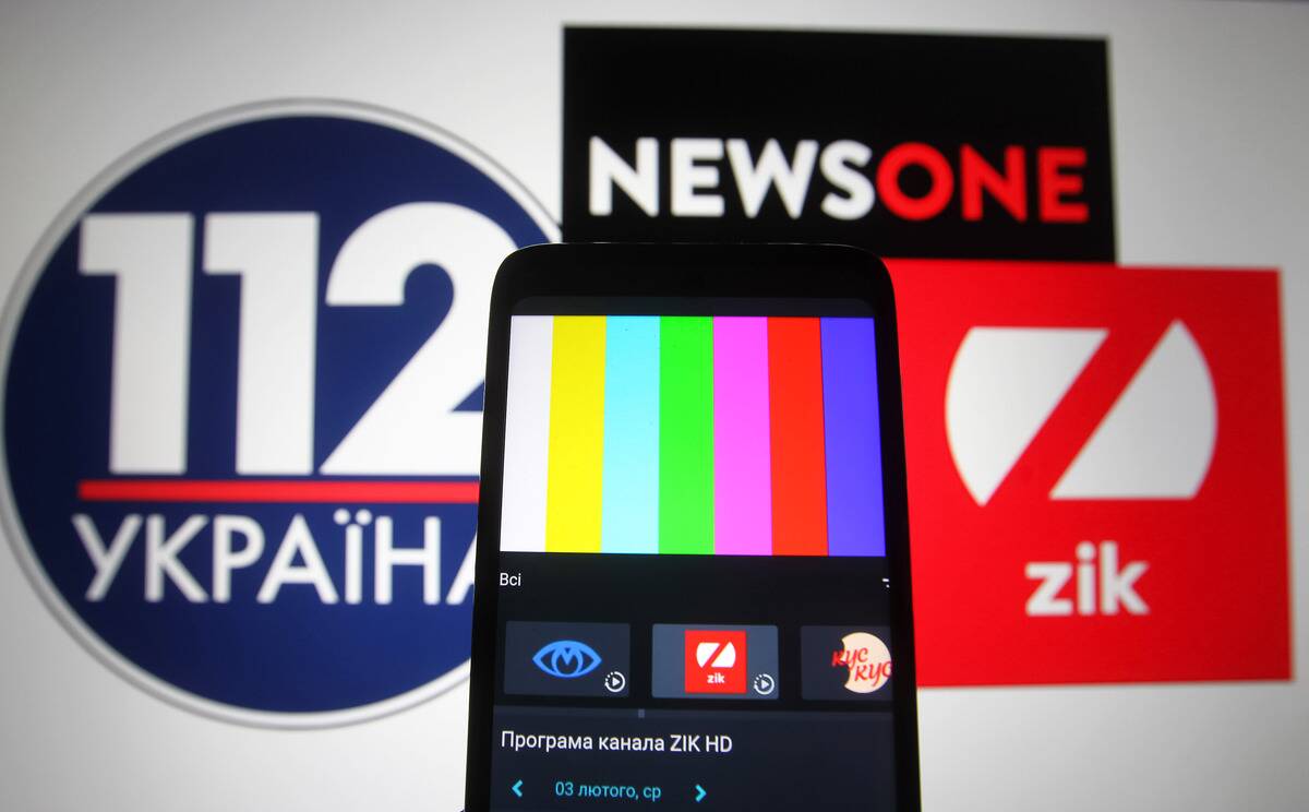 In this photo illustration a rainbow TV test pattern without...