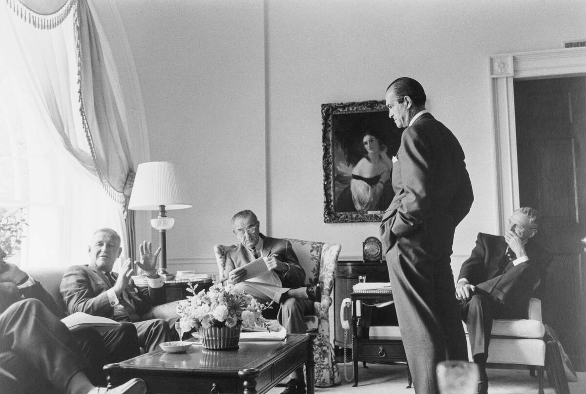 Johnson Confers To End Bombing In Nam