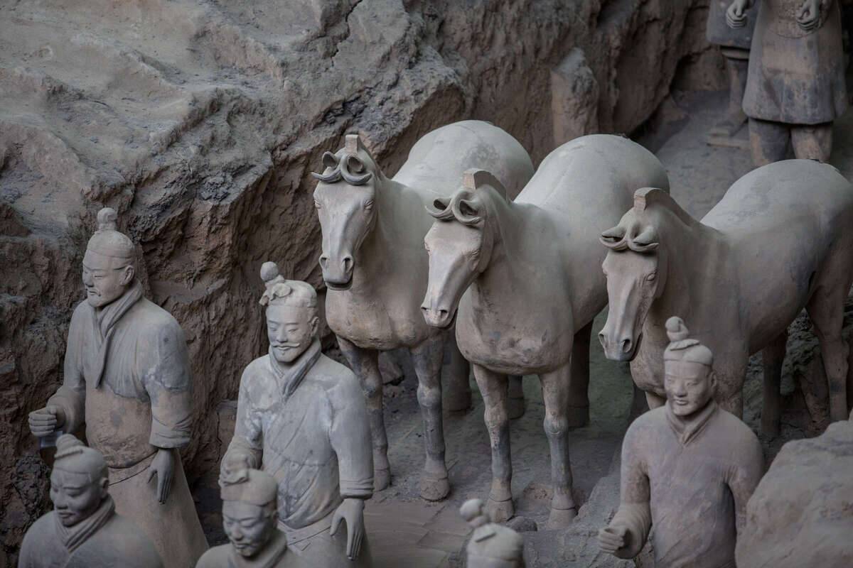 Life size terra cotta warriors in Emperor Qins mausoleum...