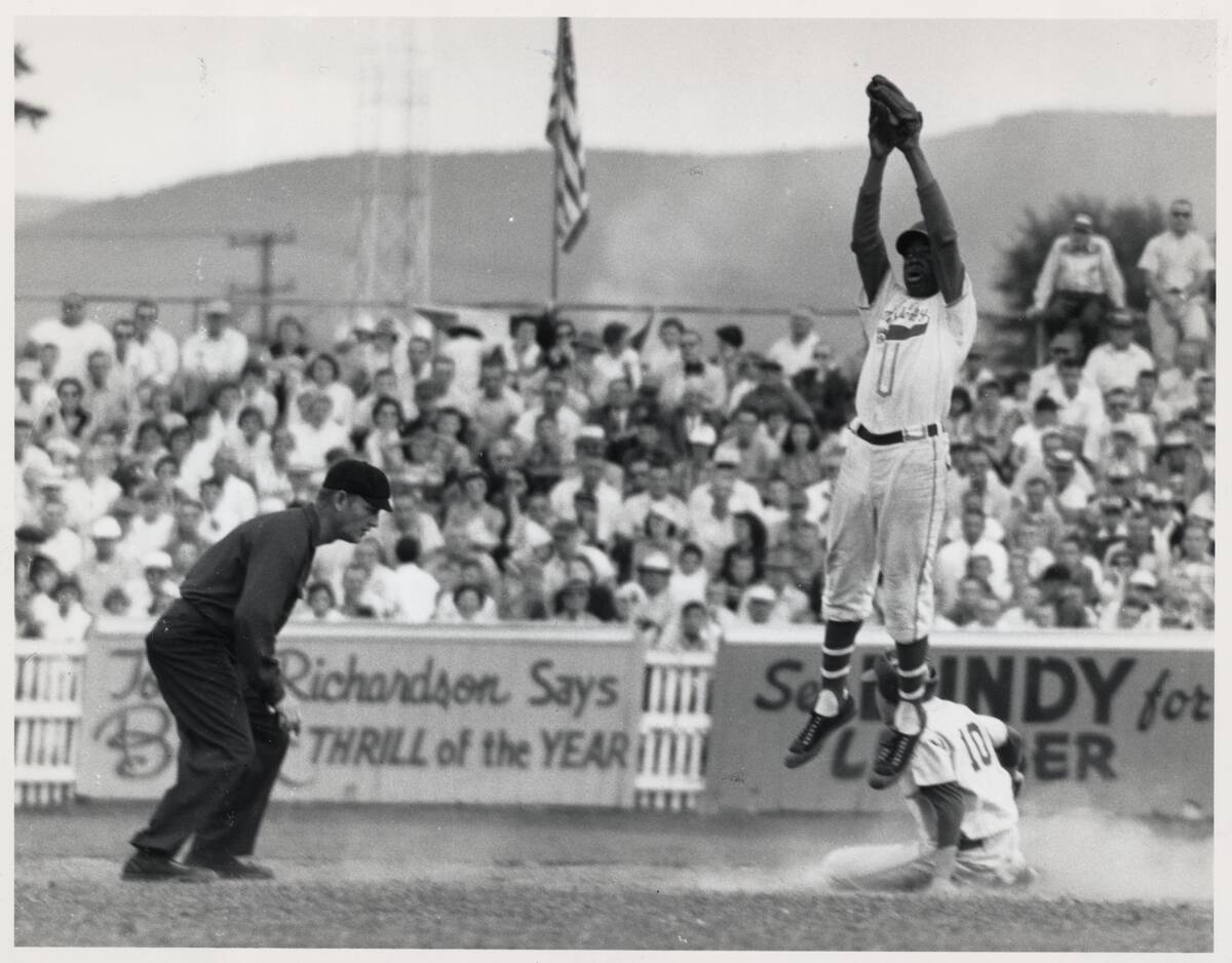 Little Leaguer Sliding Safely Into Second