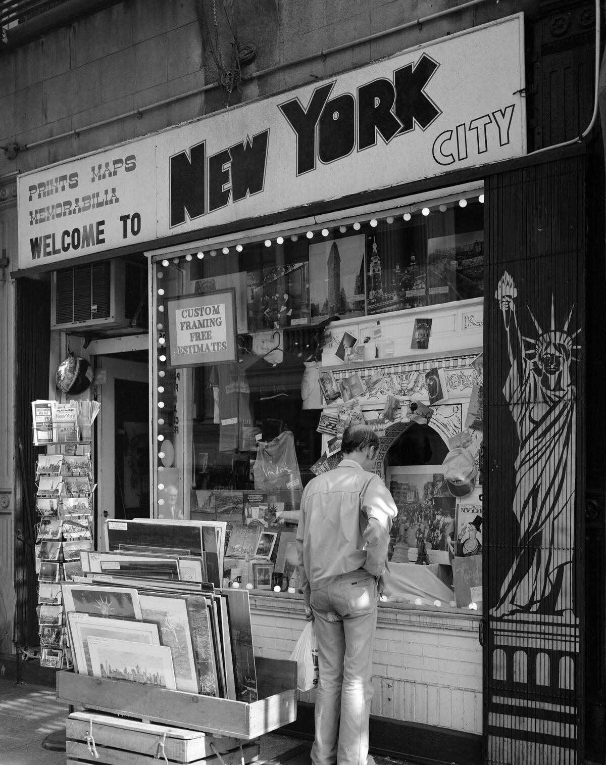 Man Window Shopping At Souvenir Shop
