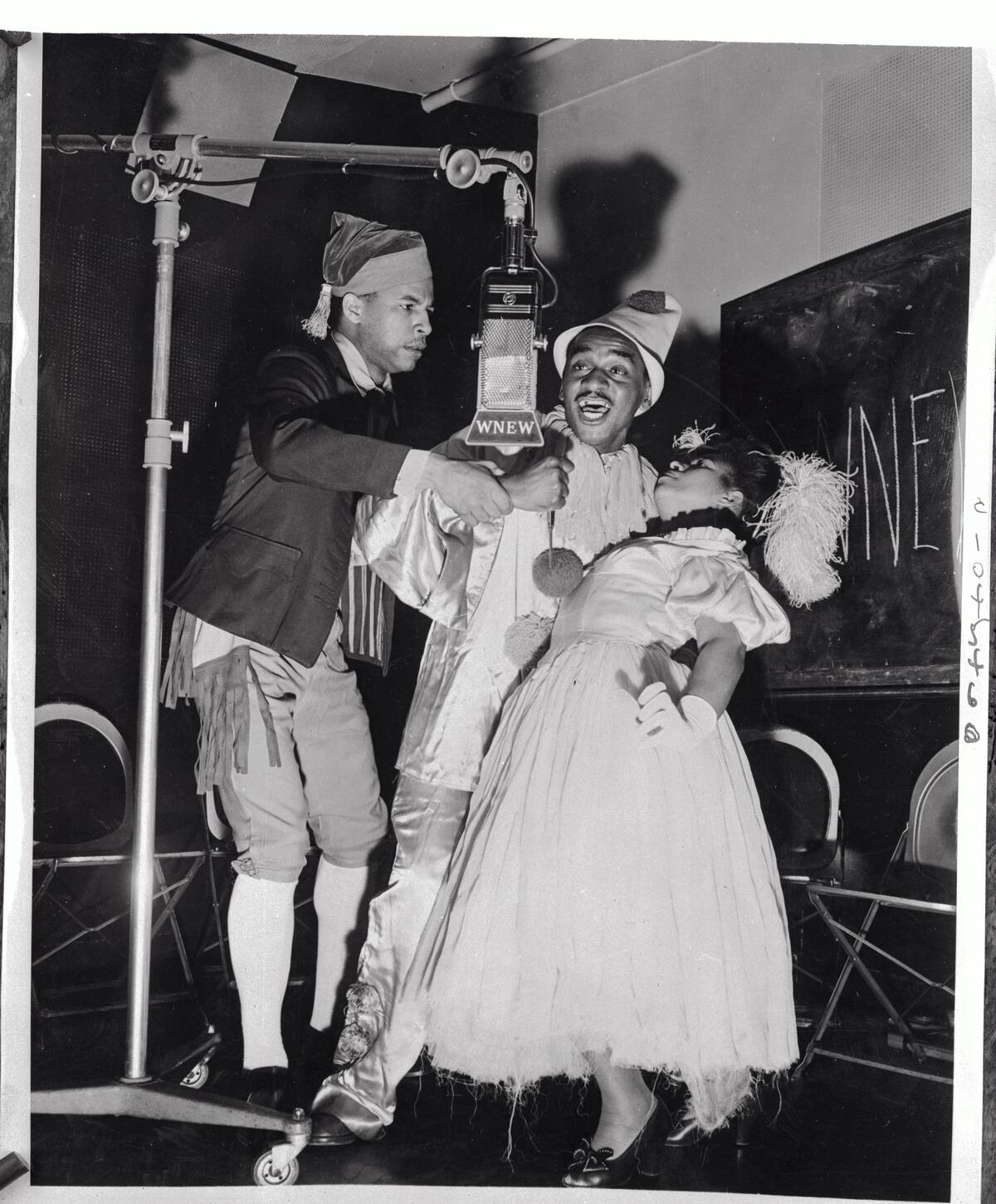 Performers Working at Microphone