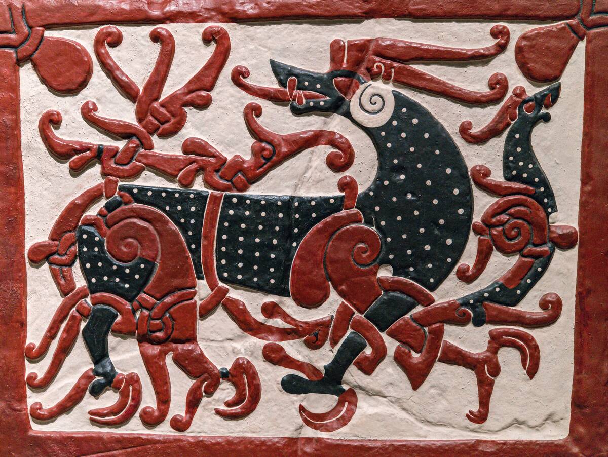 Rune stone from the Vikings time, copy in plaster. The...