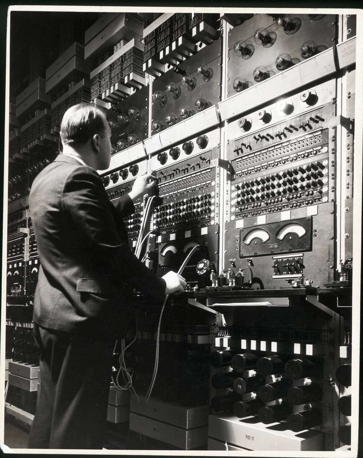 Technician Checking Telegraph Wires