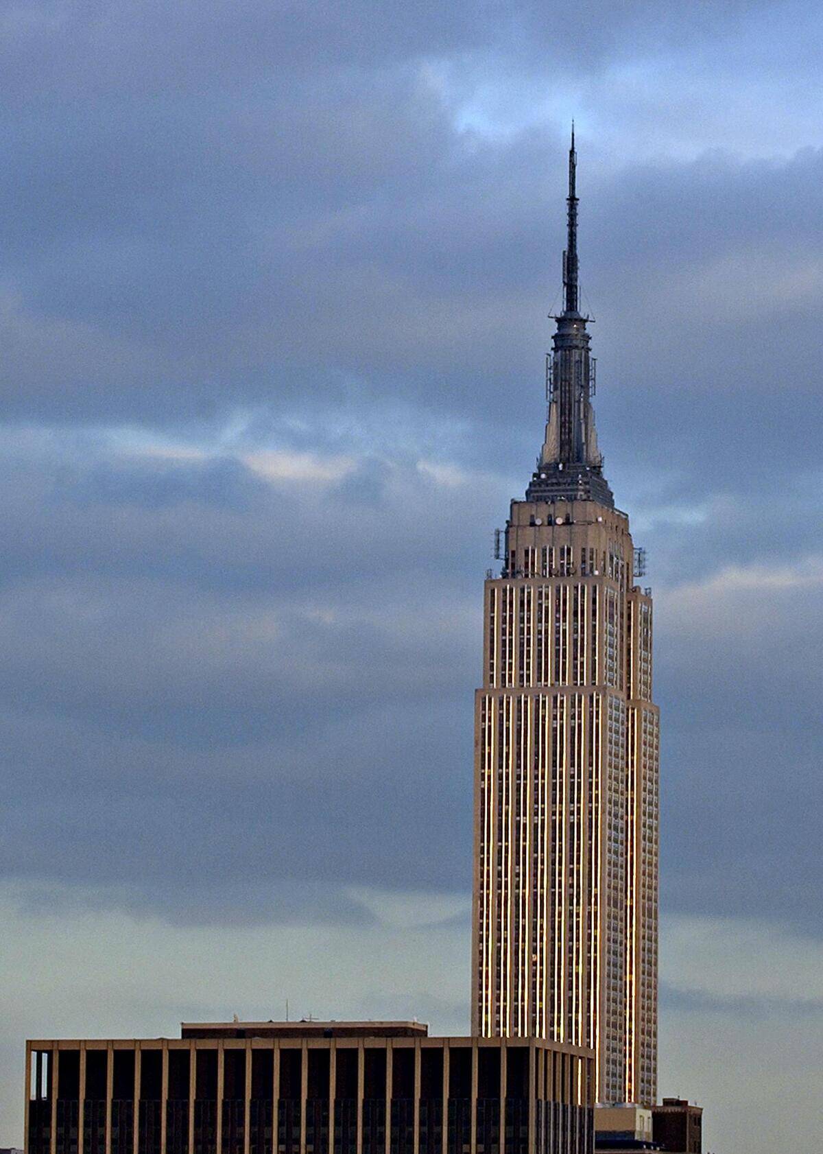 The Empire State Building reflects light