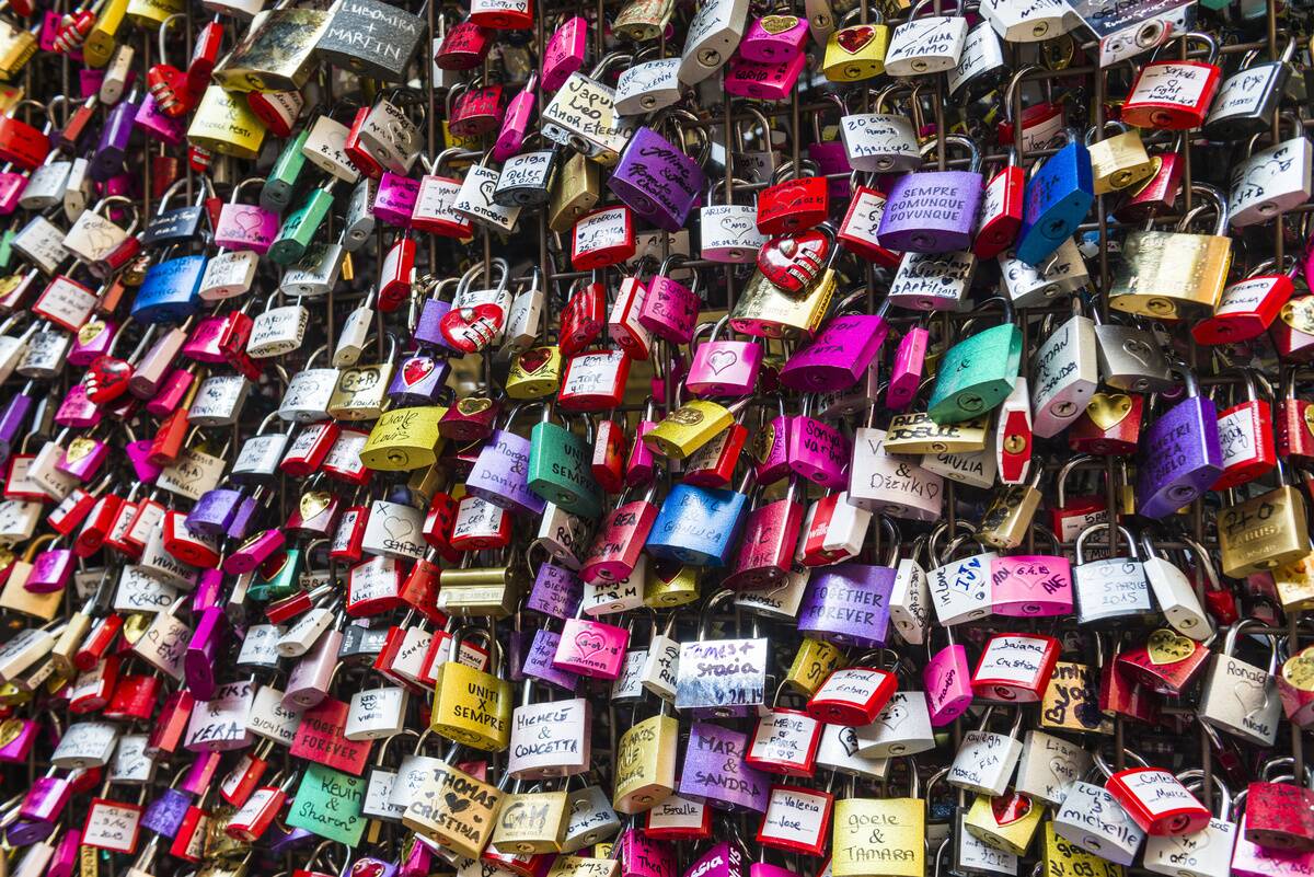Thousands of colorful padlocks are locked as love vows at...