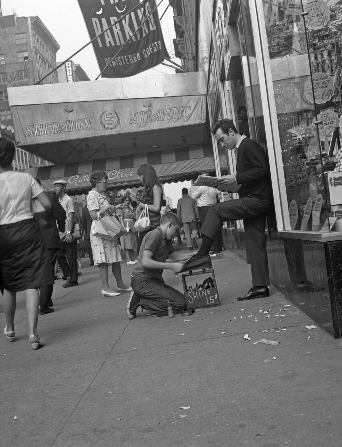 Young Boy Shines Shoes On Seventh Avenue, Times Square 1967