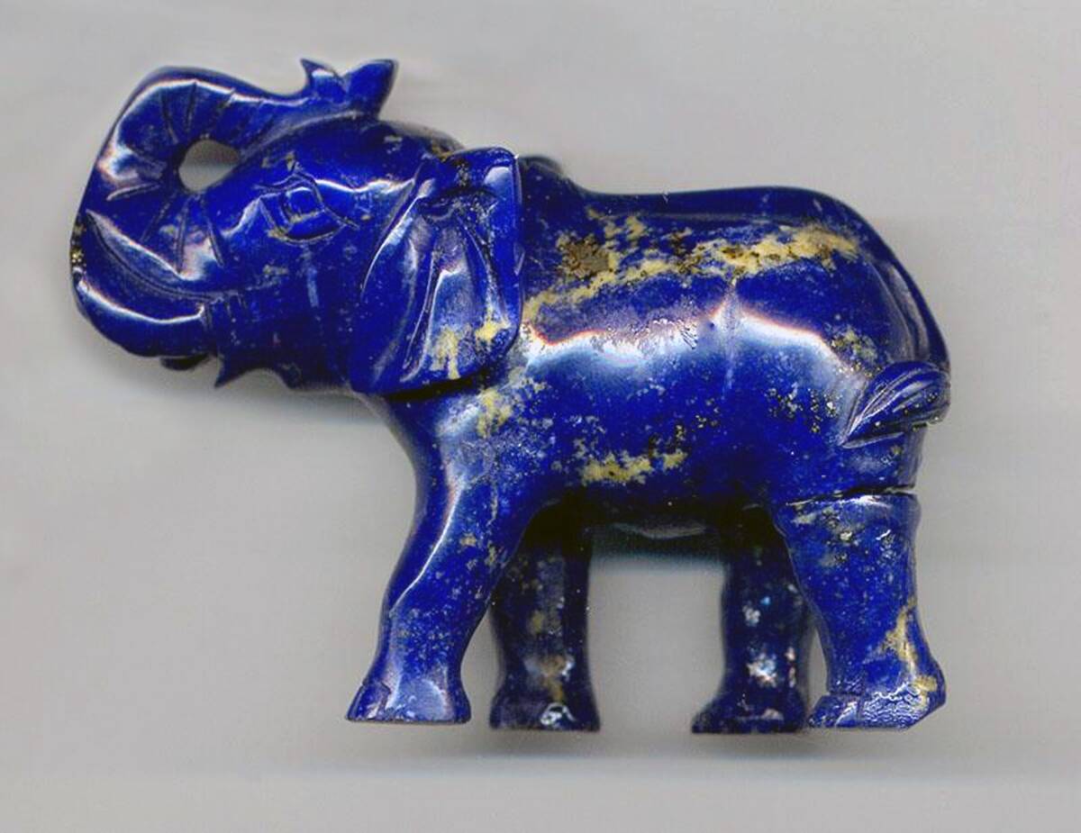 A carved elephant made from Lapis Lazuli.
