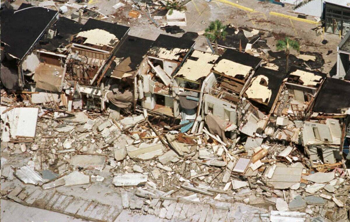 A row of destroyed townhouses sit along the Panama