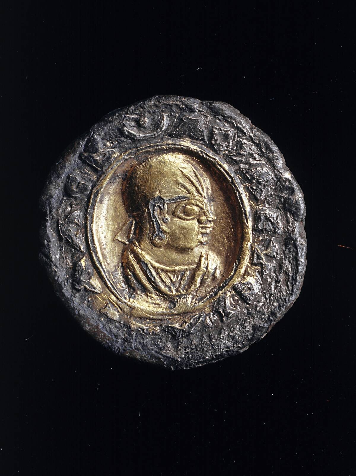 Axum coin, reverse with profile of King Aphilas...