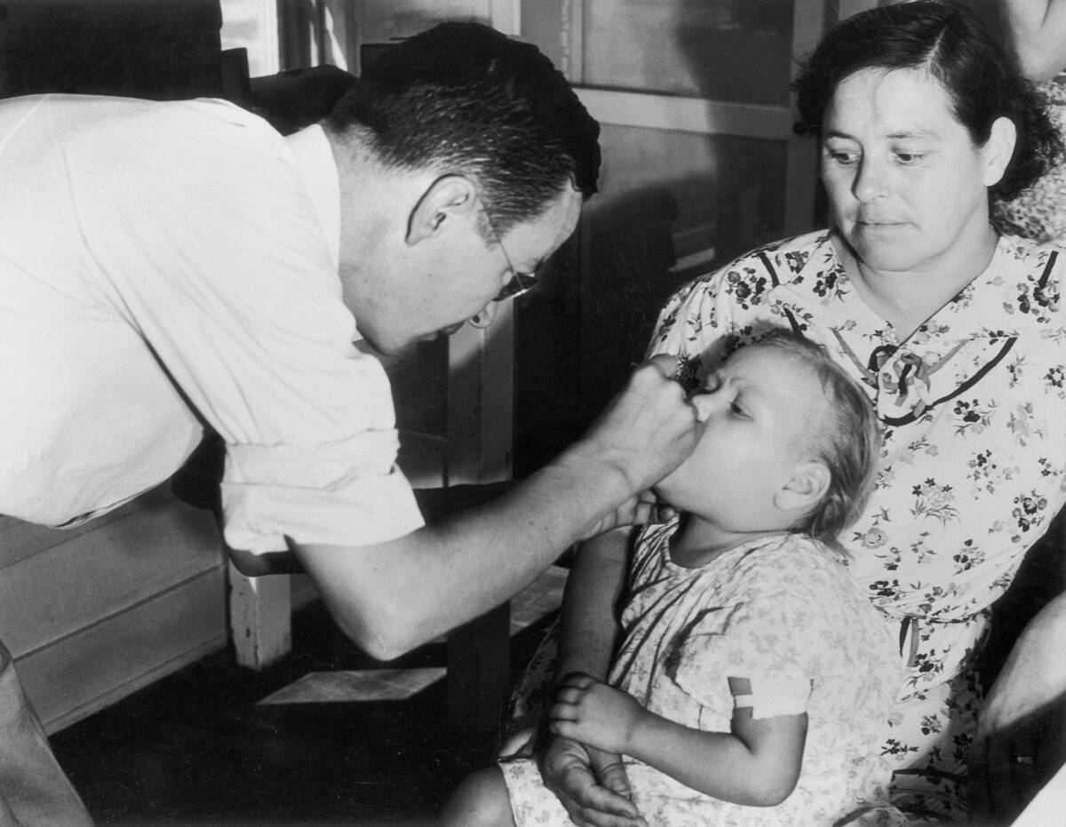 Doctor Examining a Child