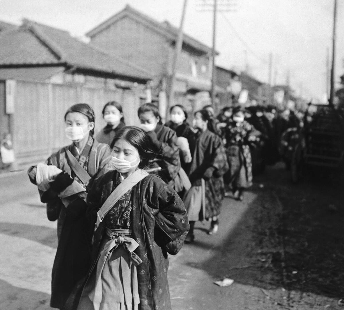 Japanese Girls Wear Masks for Protection