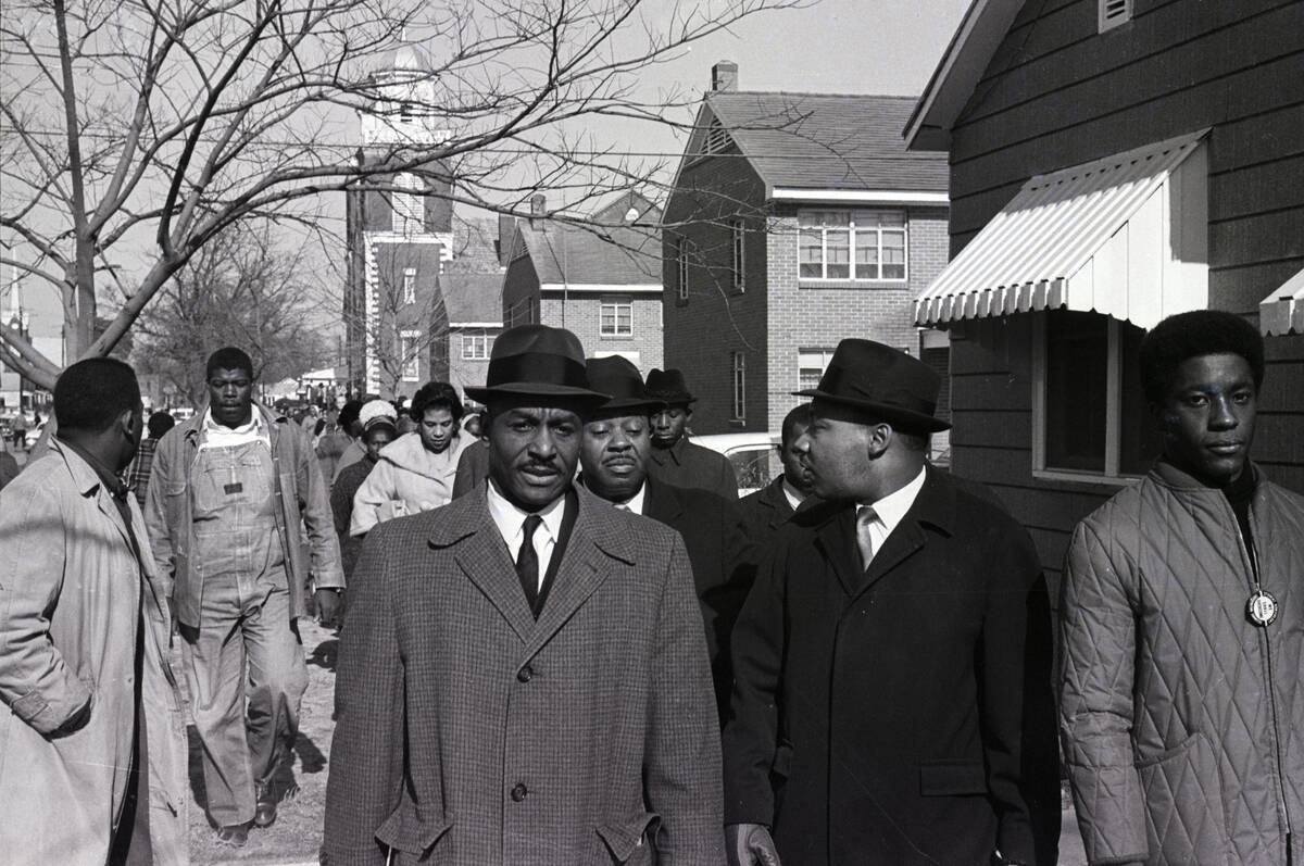 Martin Luther King Leading Group from Church