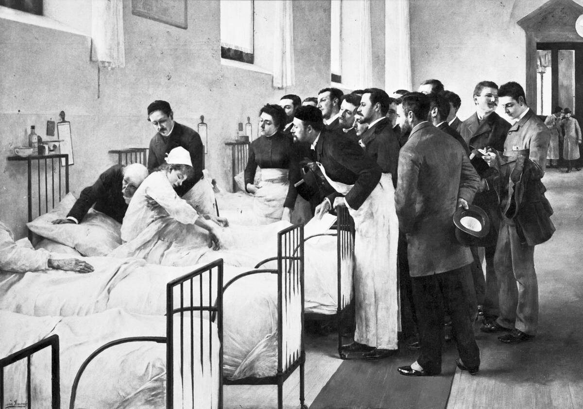 Medical Students and Professor at Clinic