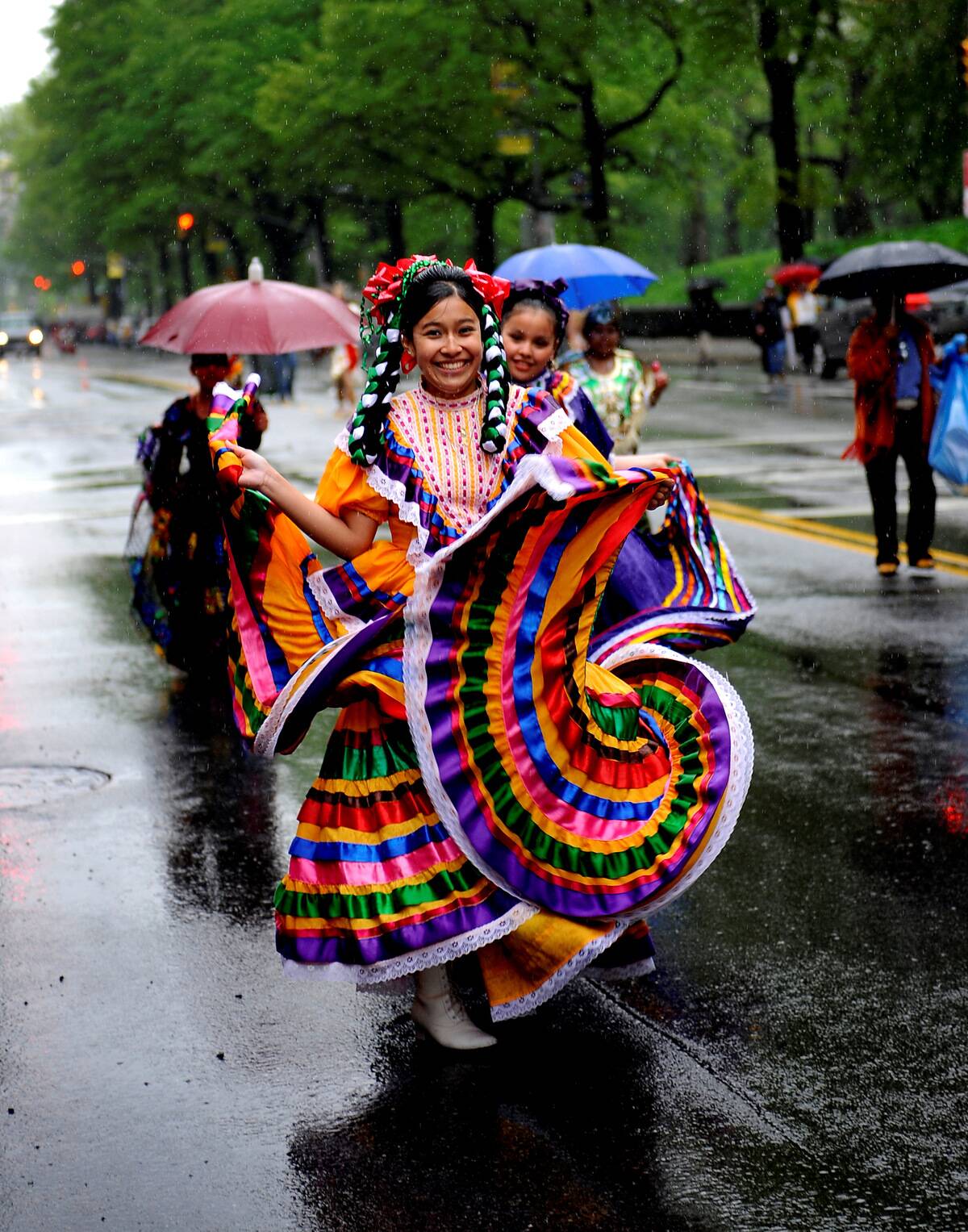 Pouring rain didn't dampen the spirits of hundreds of revele
