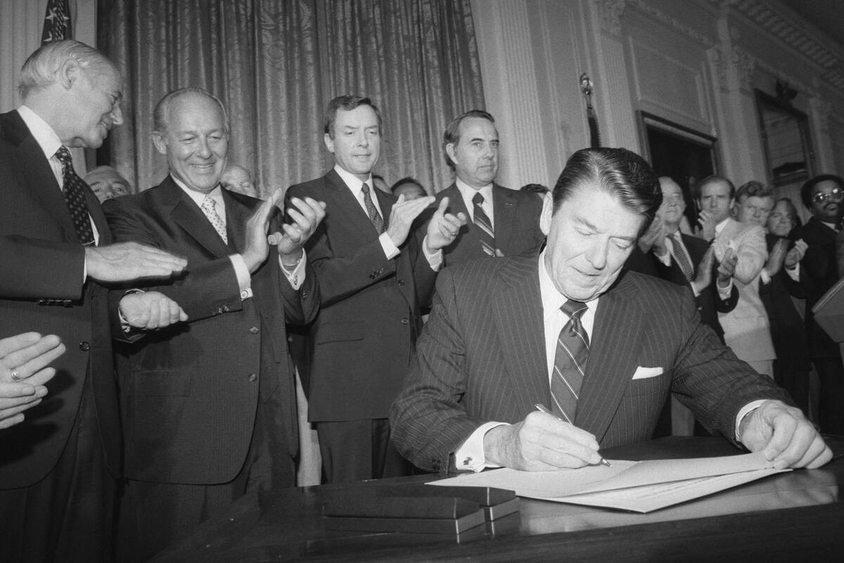 Ronald Reagan Signing Voting Rights Act