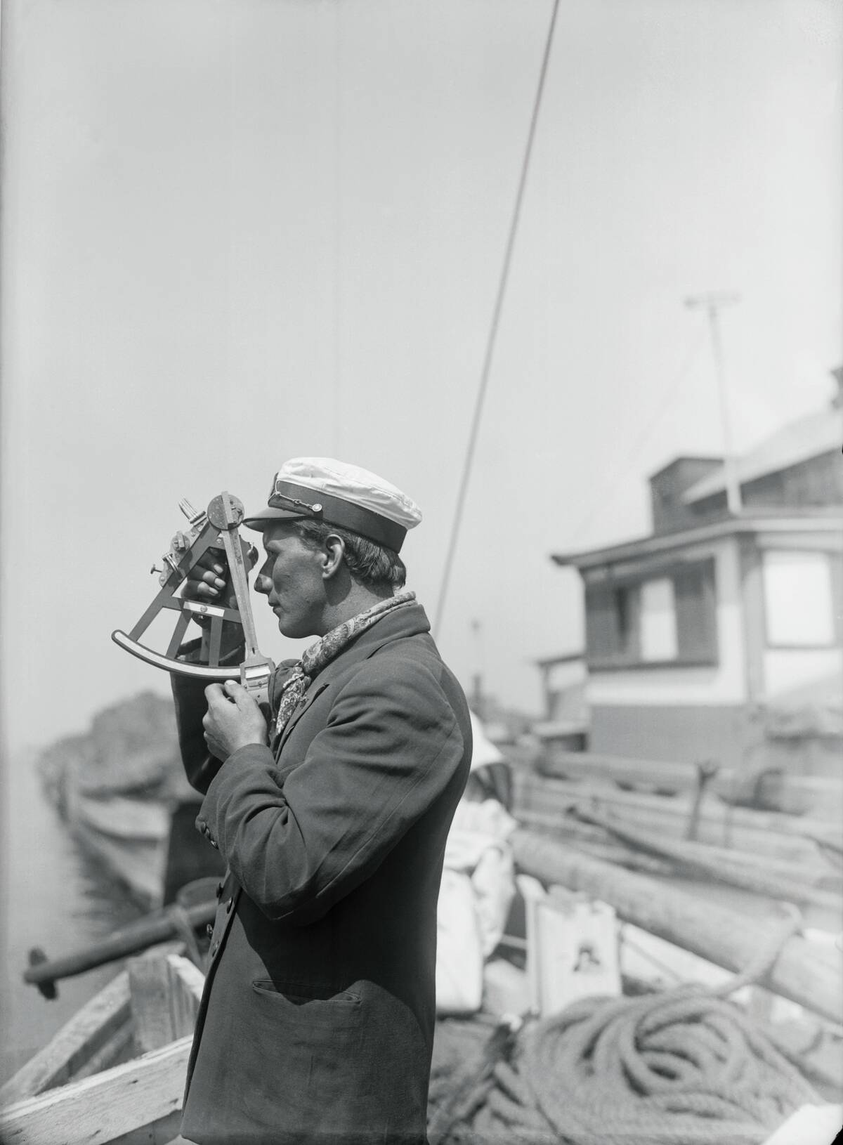 Ship Pilot Using Old Sextant