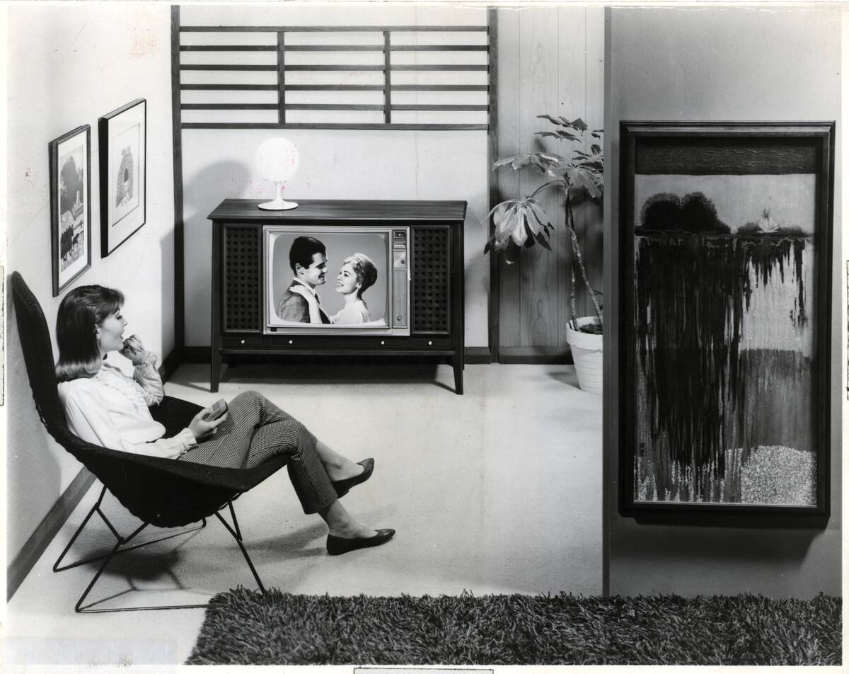 Woman Watching TV in Living Room