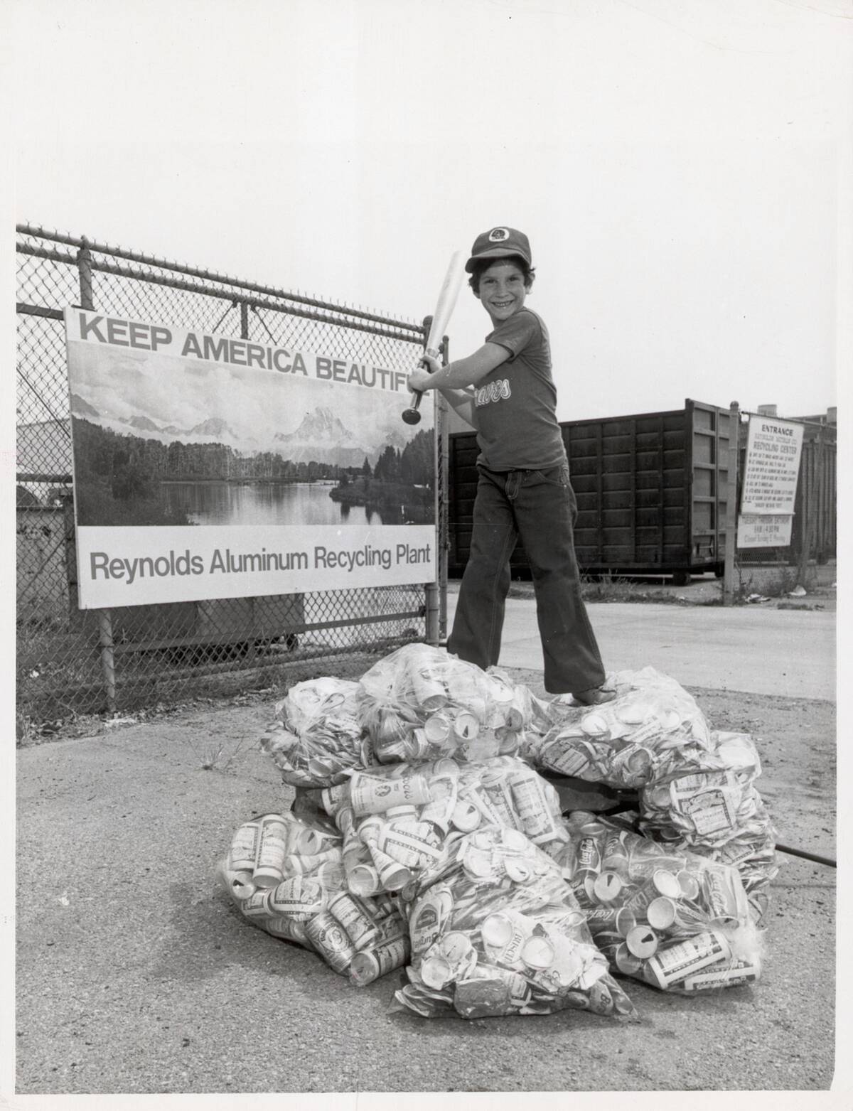 Boy Exchanges Aluminum Cans for Bats