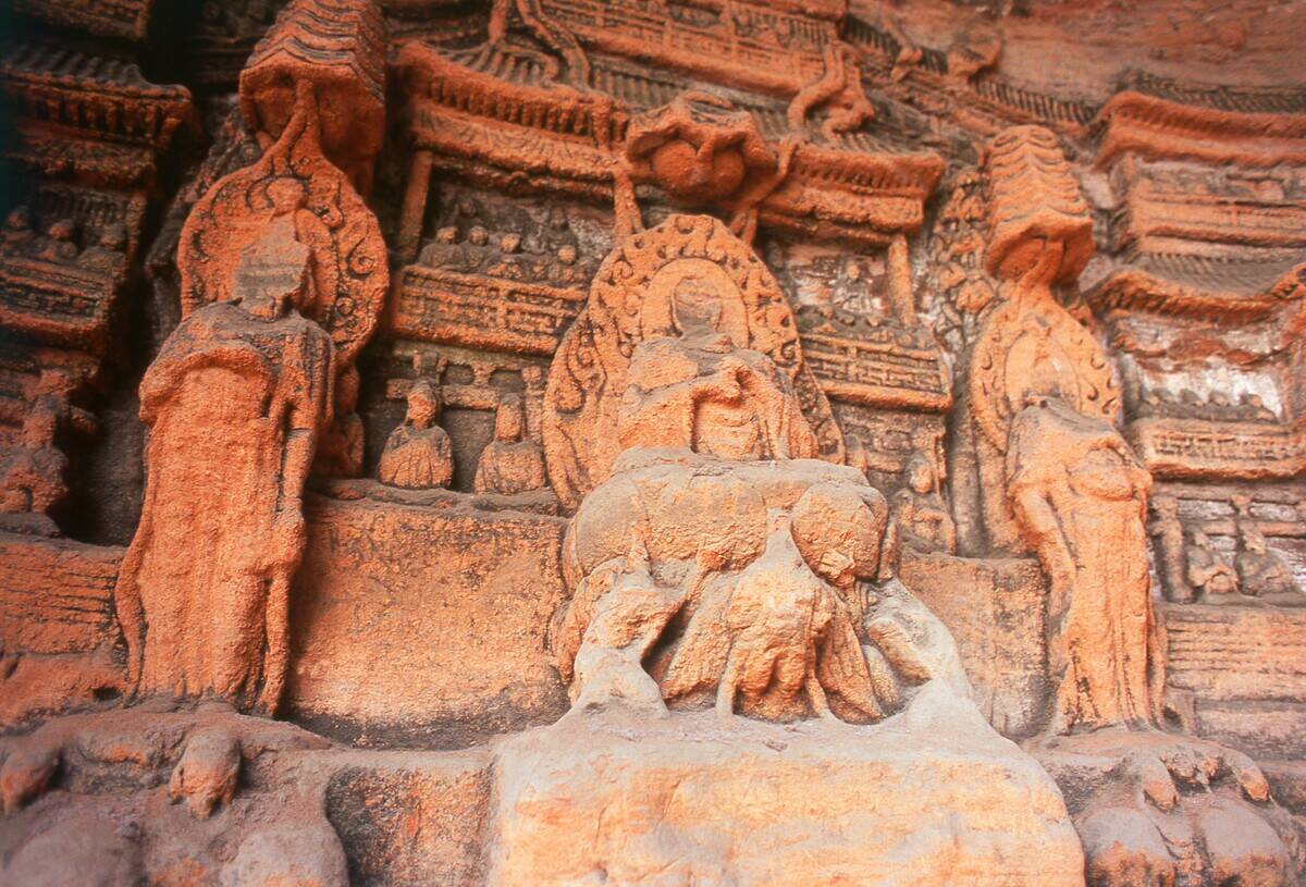 China: Buddhist carvings made in the sandstone cliff surrounding the Dafo (Giant Buddha), Leshan, Sichuan Province.