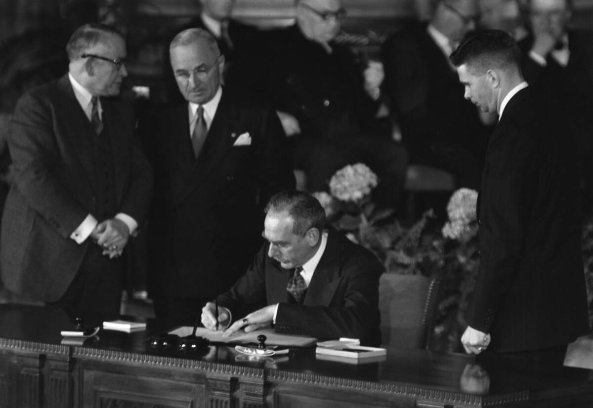 Dean Acheson signs North Atlantic Treaty