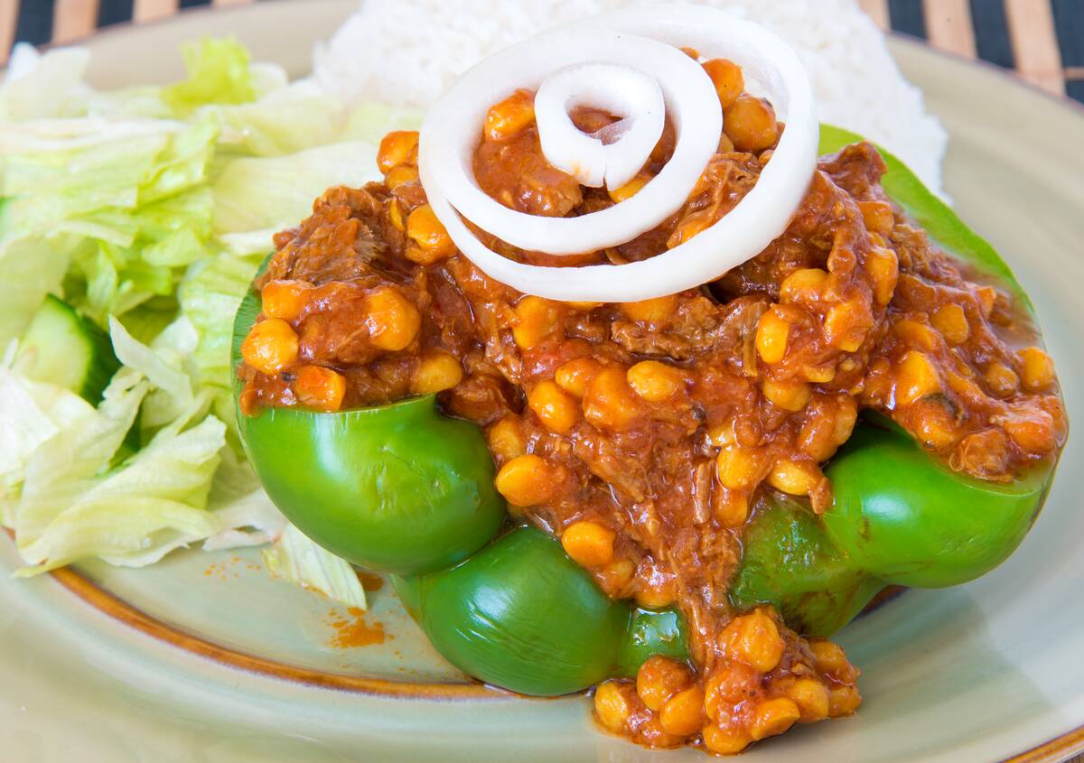 Iranian Cuisine: Khoreshte Ghimeh Ghimeh served in a green...