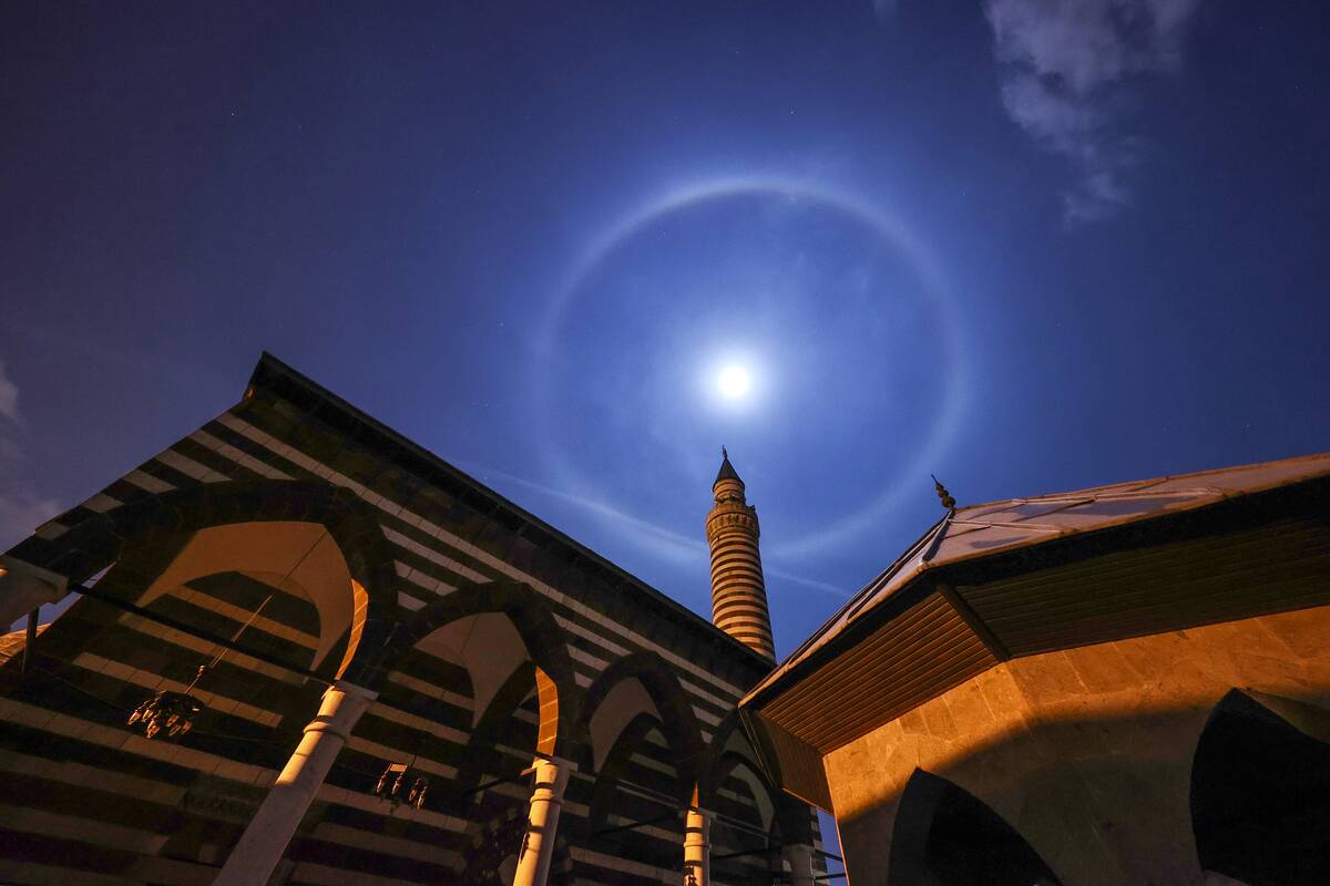 Lunar halo over historical Mosques in Turkey's Van
