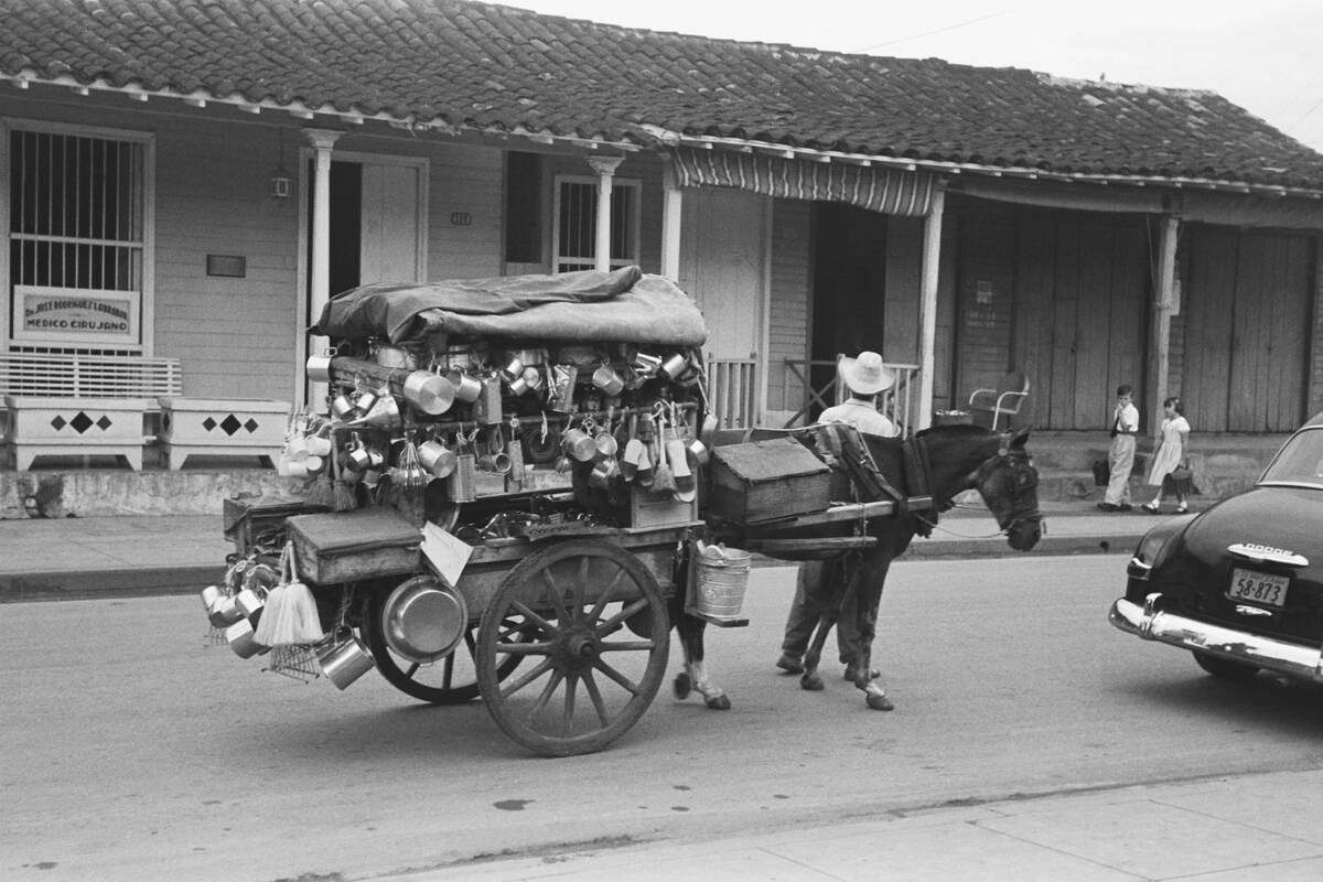 Peddler Walking with Horse Cart