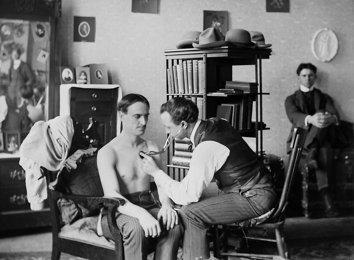Physical exam at home, ca. 1895.