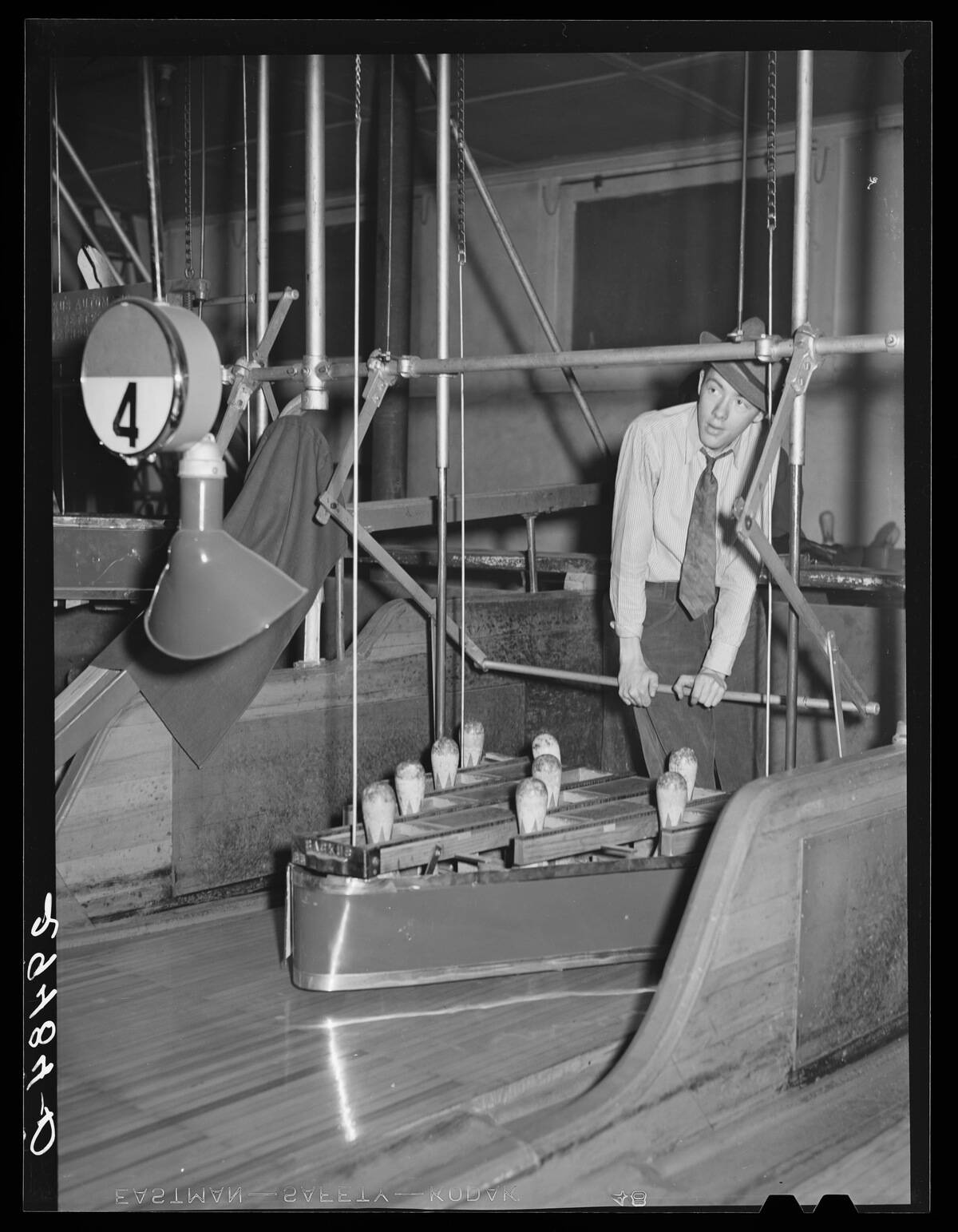 Pinsetter In A Bowling Alley