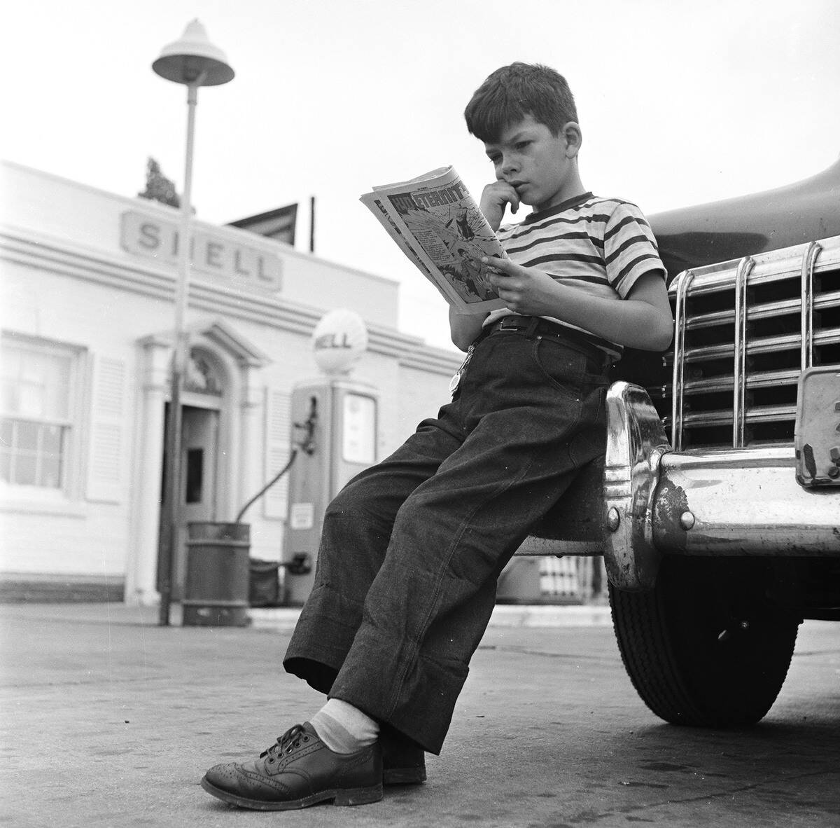 Reading At The Gas Station