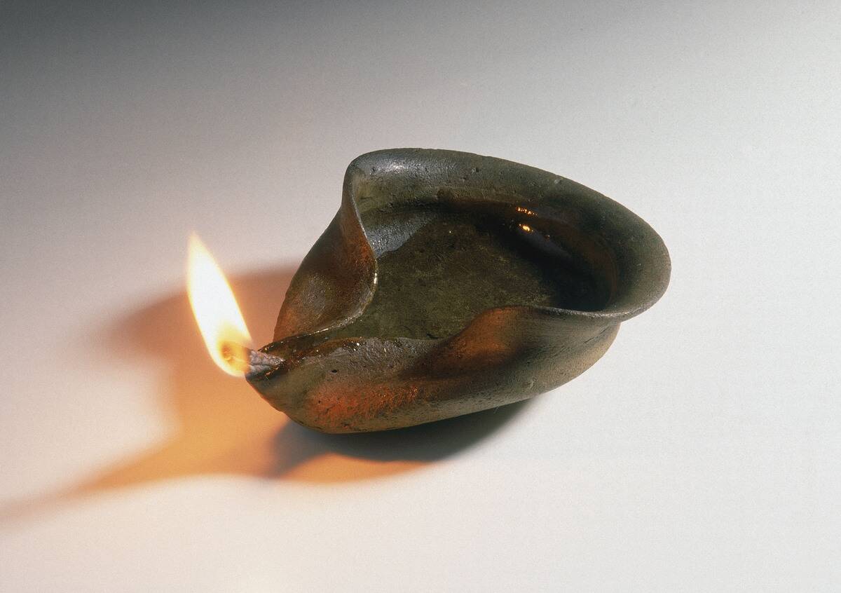 Small pottery oil lamp, probably Egyptian or Romano-Egyptian, 1st century AD.
