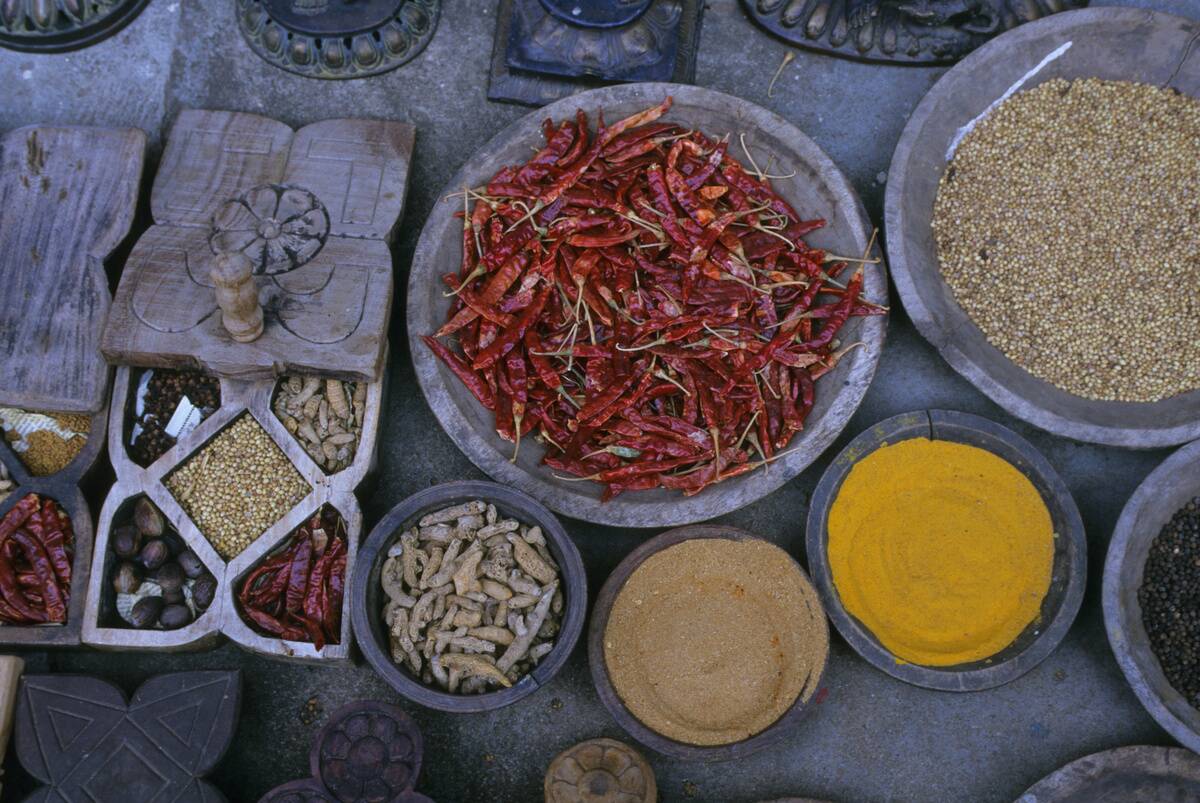 Spices including chili peppers, nutmeg, ginger and cloves...