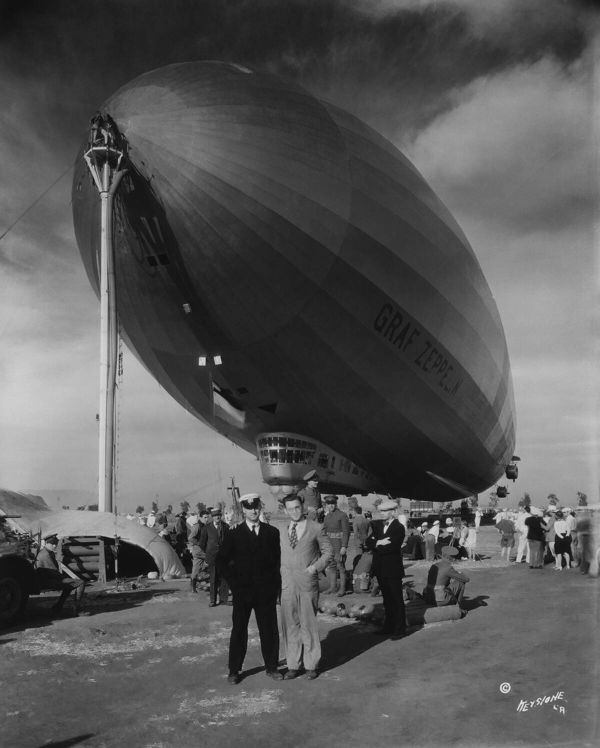 Two men posing with the Graf Zeppelin
