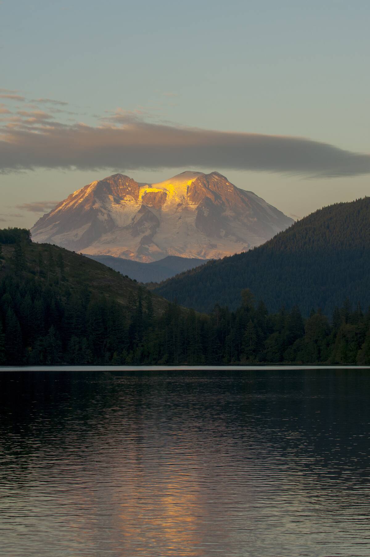 View of Mineral Lake at sunset with Mount Rainier in the...