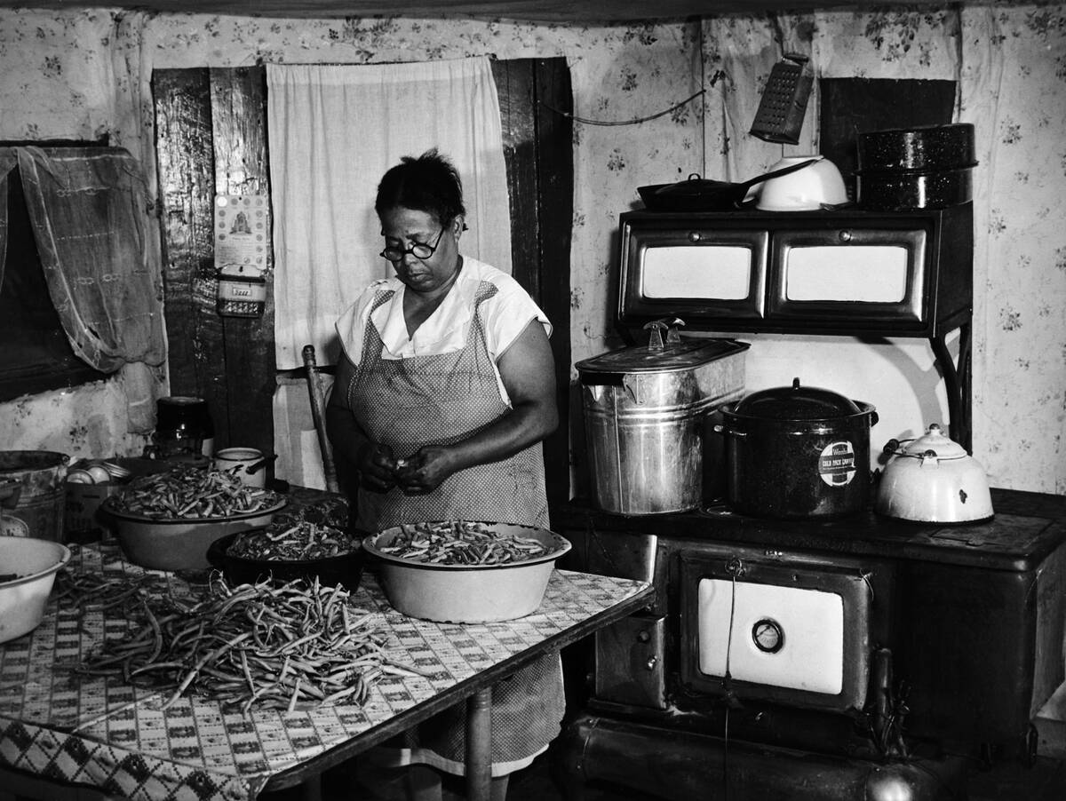 Woman Working In Kitchen Cooking