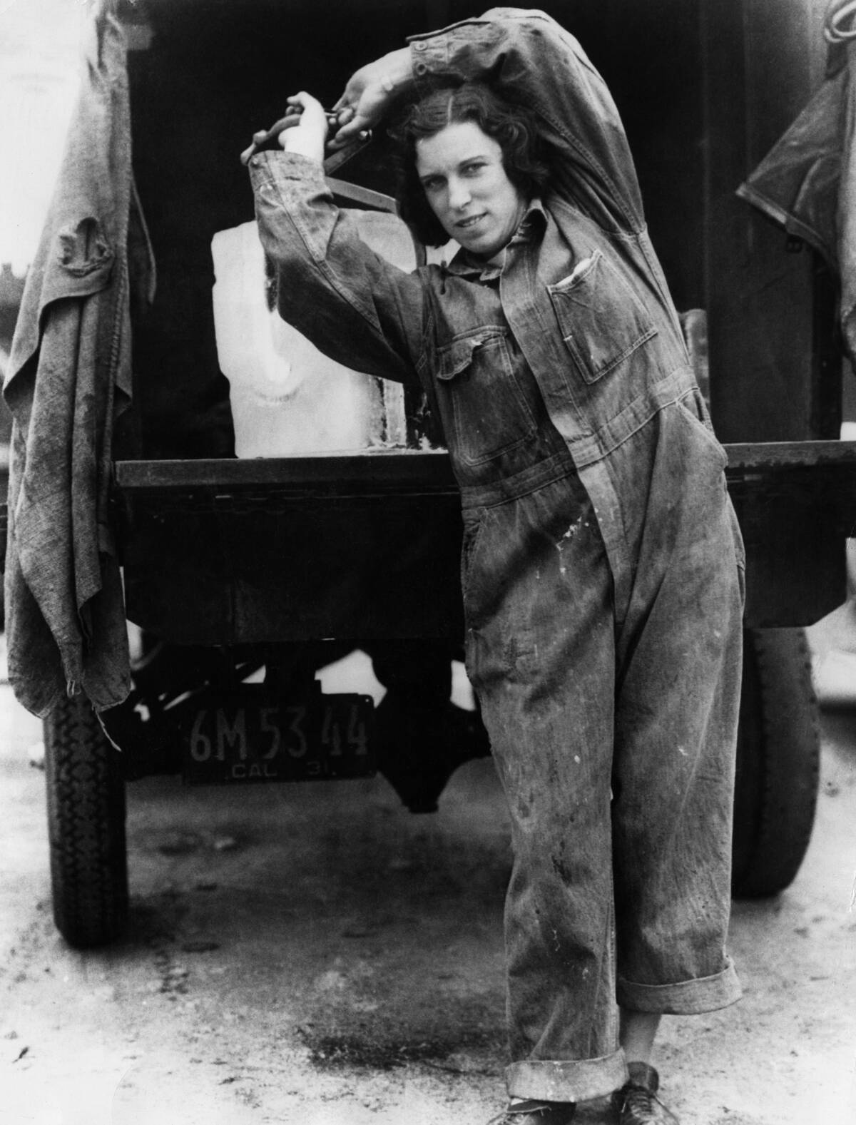 Young Woman Making an Ice Delivery