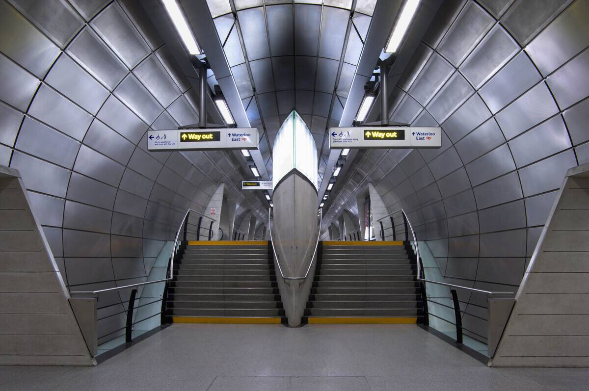 Internal platform level view of passenger stairway at Southwark tube station, London, UK