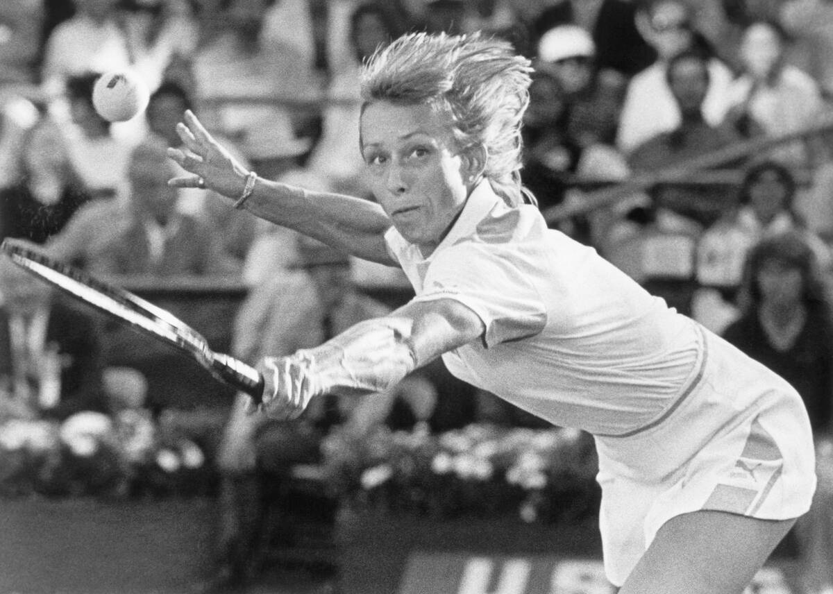 Martina Navratilova Reaching for a Shot