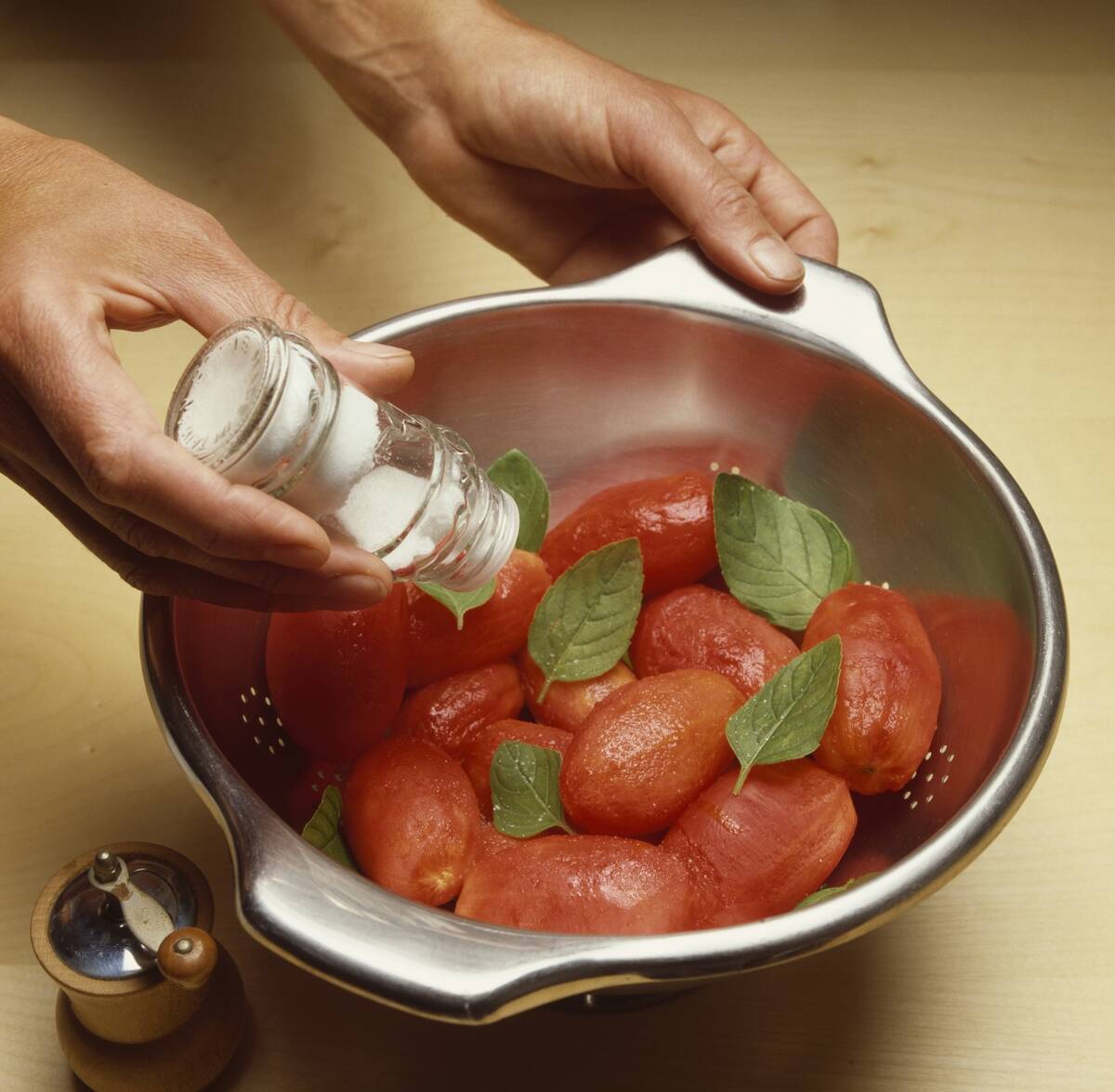 Peeled tomatoes with basil and salt...