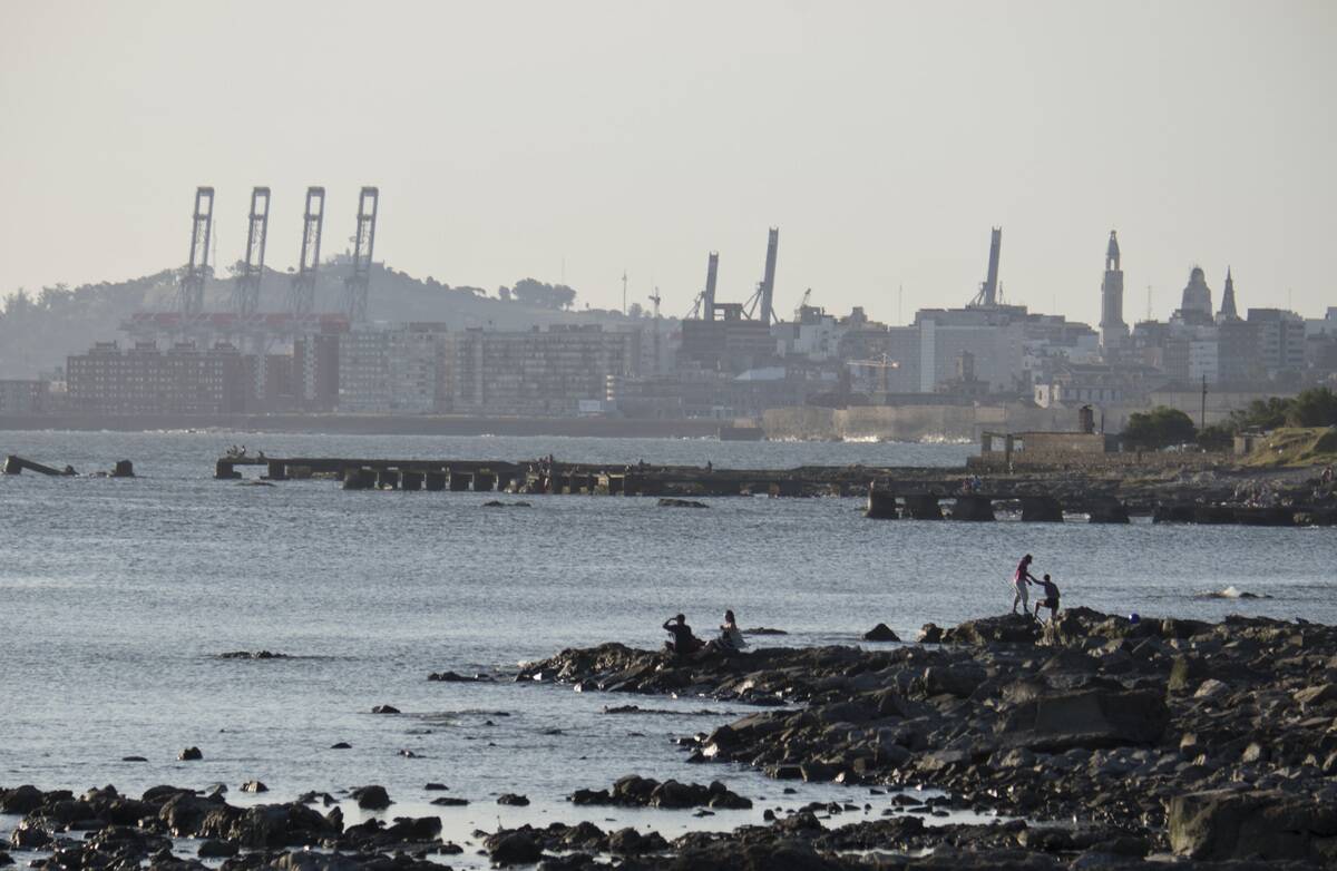 People fishing by the beach near Punta Carretas in Montevideo,Uruguay