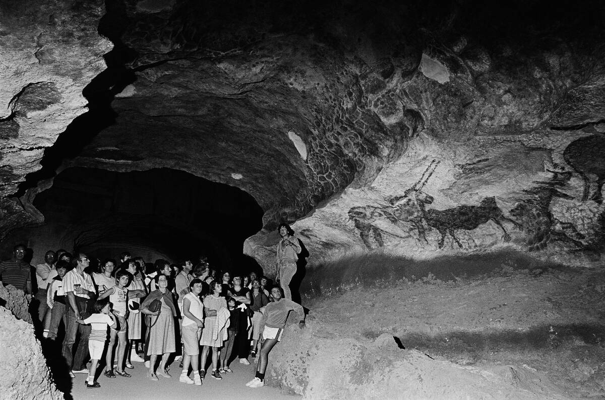 Visitors Inside Lascaux II Grotto in France