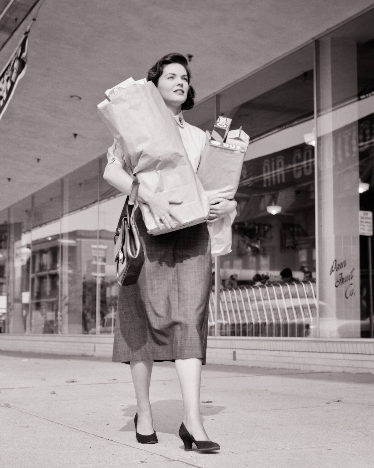 1950s Woman Shopper Carryin...