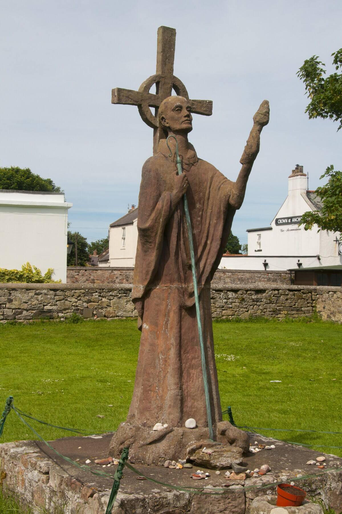 A modern statue of St Aidan in the Lindisfarne Priory ruins, Lindisfarne, England. Sculptor Kathleen Parbury, 1958.