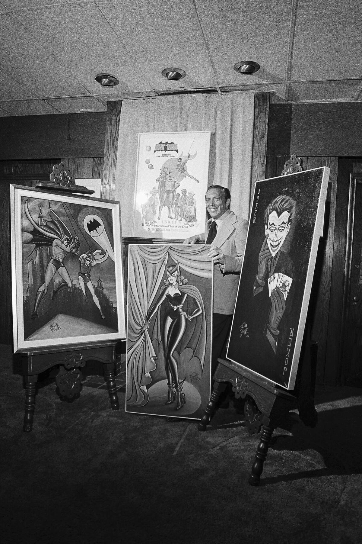 Bob Kane Posing With Drawings of his Characters