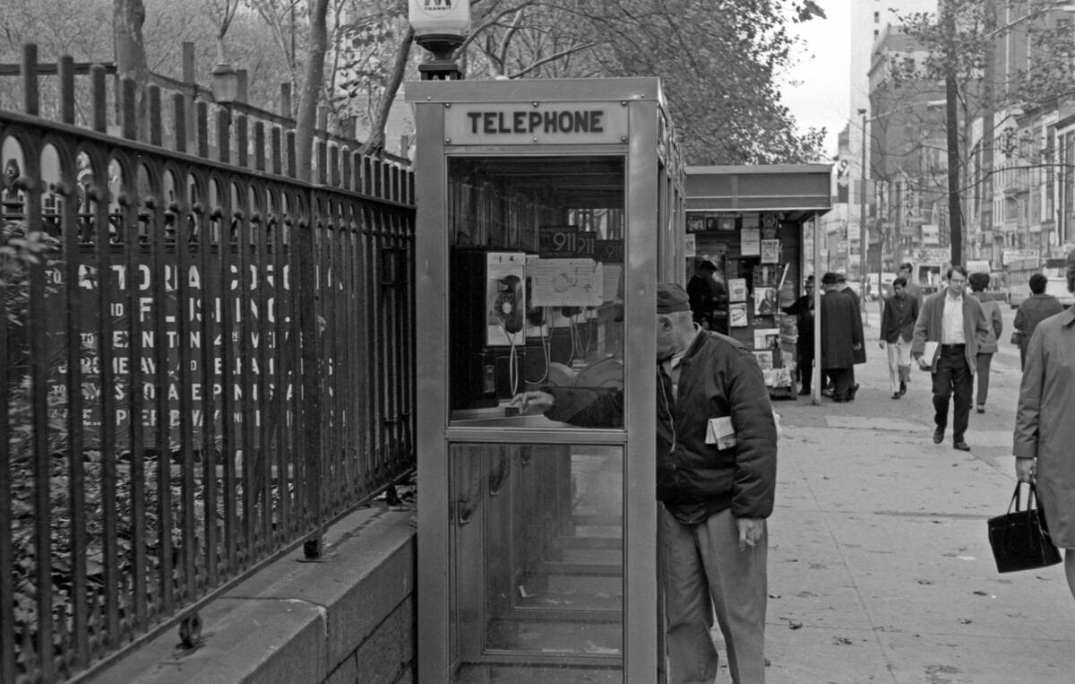 Man Using Pay Phone, 42nd Street Times Square New York 1970