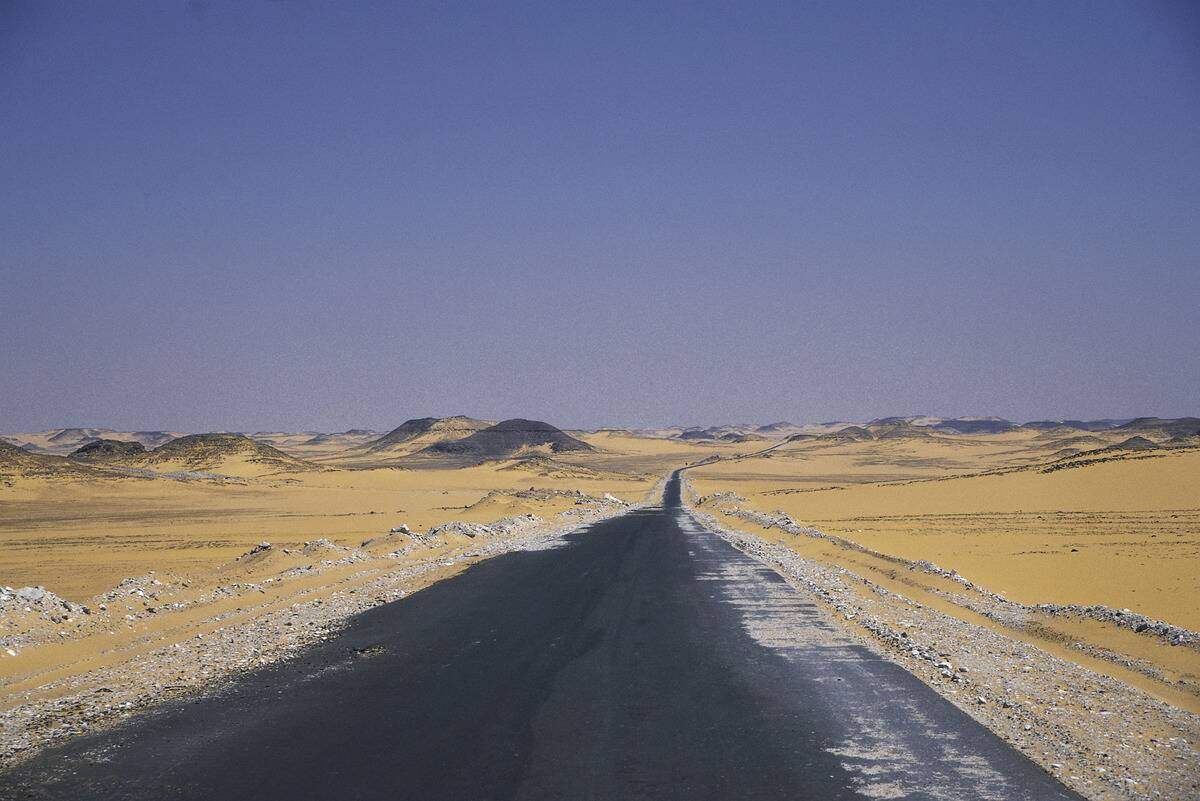 Road crossing Nubian desert, Egypt