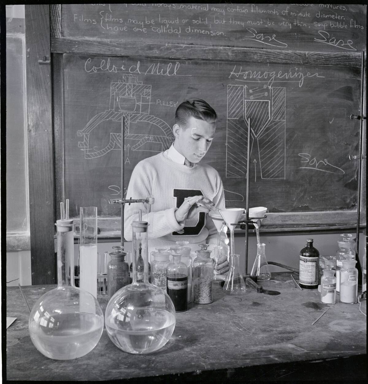 Student Doing Experiment in Laboratory